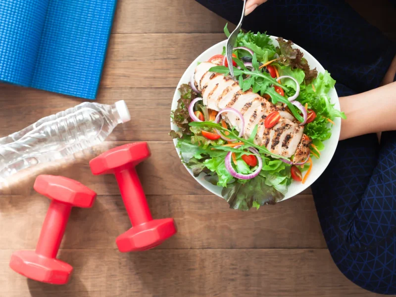 healthy-fitness-food-chicken-salad-dish-with-fitness-equipments-2048x1365
